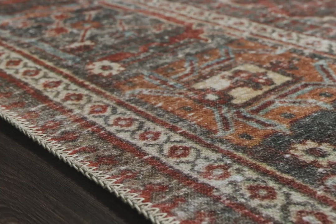 Load video: Timeless and classic, the Loren Brick / Midnight Area Rug offers vintage hand-knotted looks at an affordable price. Created in Turkey using the most advanced rug-making technology, these printed designs provide a textured effect by portraying every single individual knot on a soft polyester base.  Power Loomed 100% Polyester LQ-13 Brick / Midnight