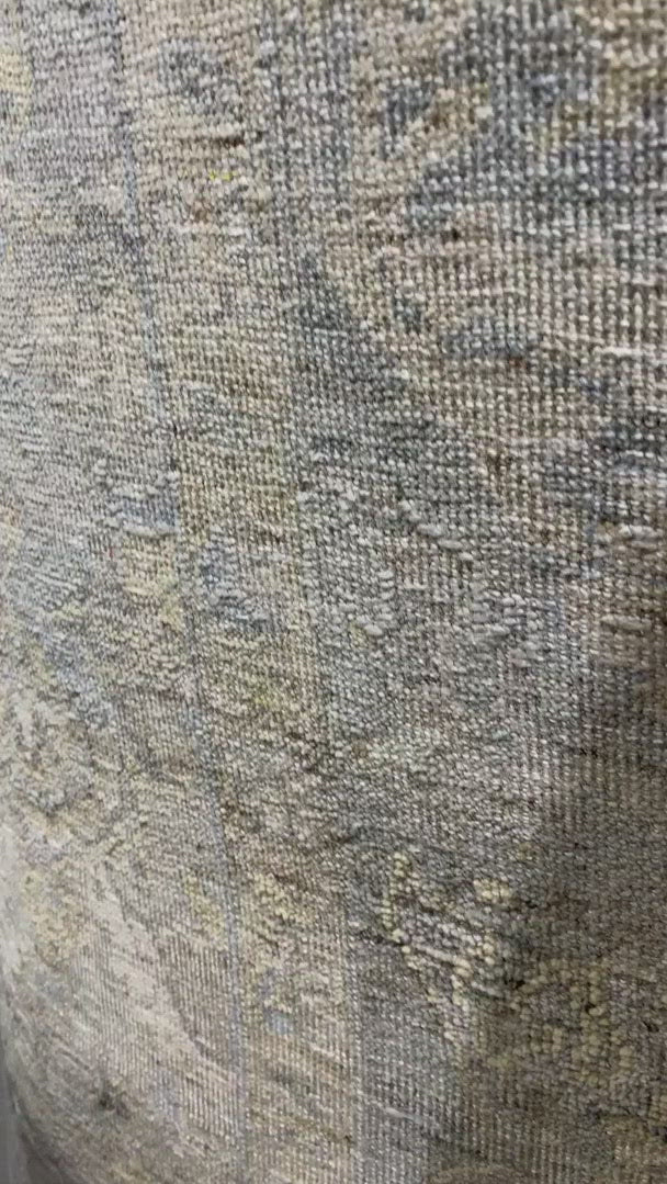 The Legacy Ash/Lagoon rug from Loloi is hand-knotted, refined, yet versatile for any home. The Legacy rug is deliberately distressed and sheared down to an extra low pile of 100% wool, creating a patina usually only imparted through decades of wear.  This rug features: - Beautiful vintage look and patina - Extra low pile - Easy to clean and maintain - Perfect for living and dining rooms, hallways, and extra large spaces  Hand-Knotted 100% Wool LZ-01 Ash/Lagoon