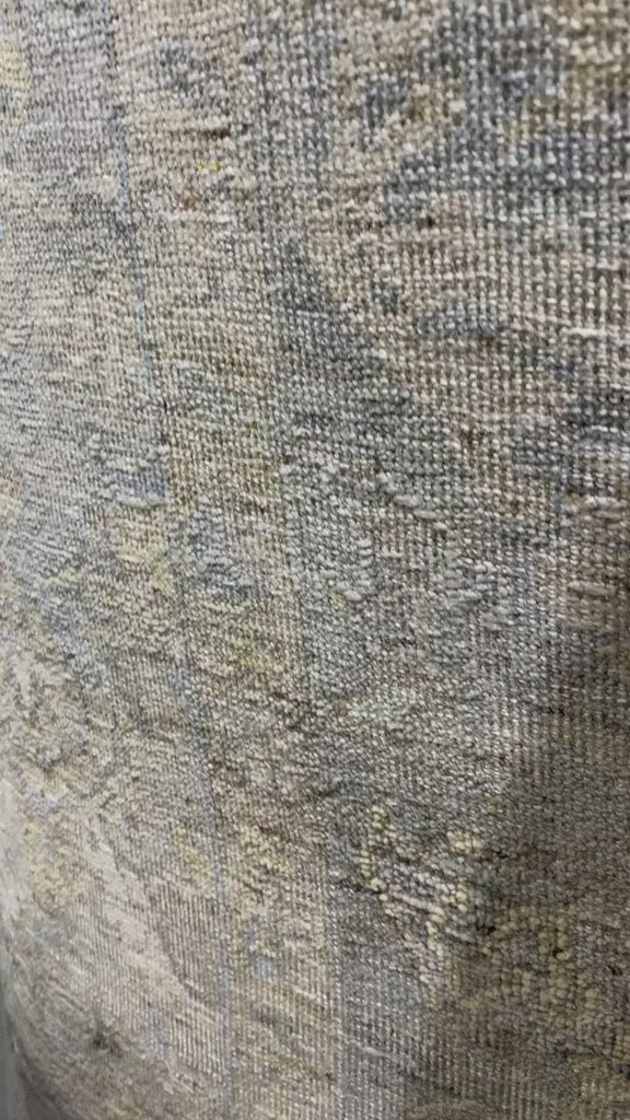 The Legacy Ash/Lagoon rug from Loloi is hand-knotted, refined, yet versatile for any home. The Legacy rug is deliberately distressed and sheared down to an extra low pile of 100% wool, creating a patina usually only imparted through decades of wear.  This rug features: - Beautiful vintage look and patina - Extra low pile - Easy to clean and maintain - Perfect for living and dining rooms, hallways, and extra large spaces  Hand-Knotted 100% Wool LZ-01 Ash/Lagoon