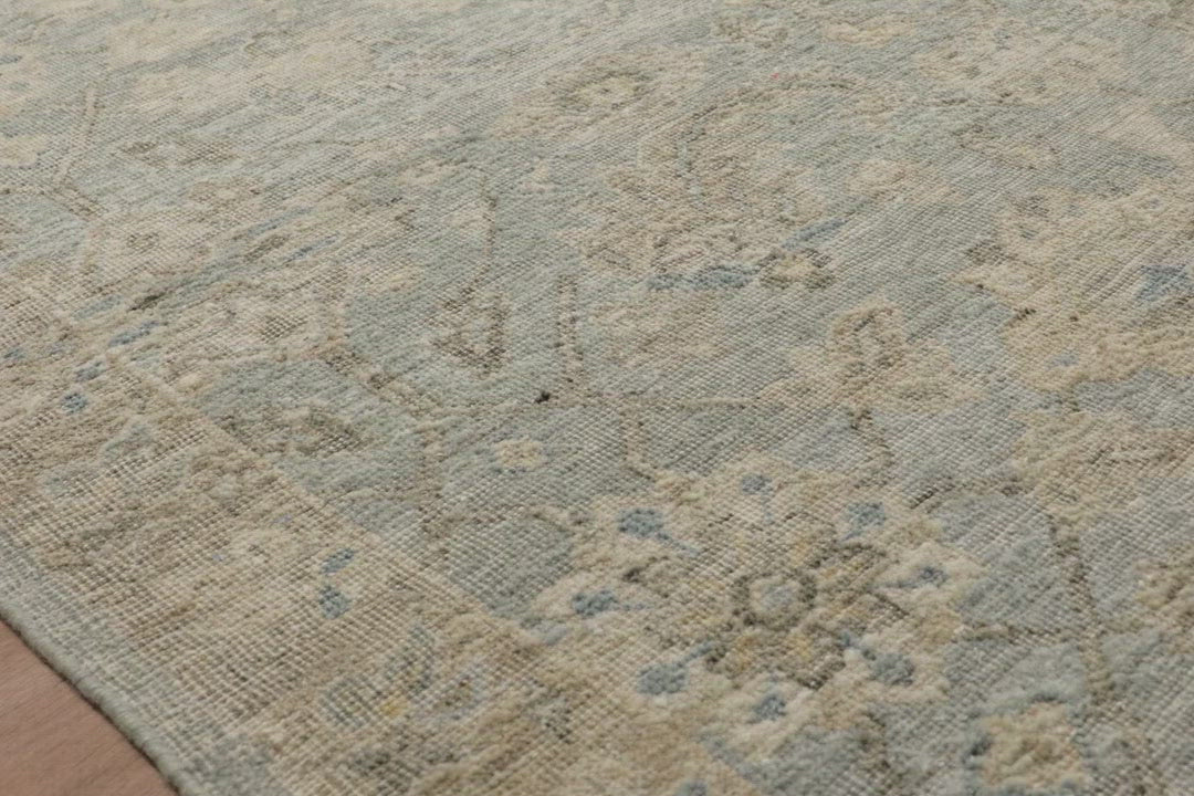 The Legacy Lagoon rug from Loloi is hand-knotted, refined, yet versatile for any home. The Legacy rug is deliberately distressed and sheared down to an extra low pile of 100% wool, creating a patina usually only imparted through decades of wear.  This rug features: - Beautiful vintage look and patina - Extra low pile - Easy to clean and maintain - Perfect for living and dining rooms, hallways, and extra large spaces  Hand-Knotted 100% Wool LZ-04 Lagoon