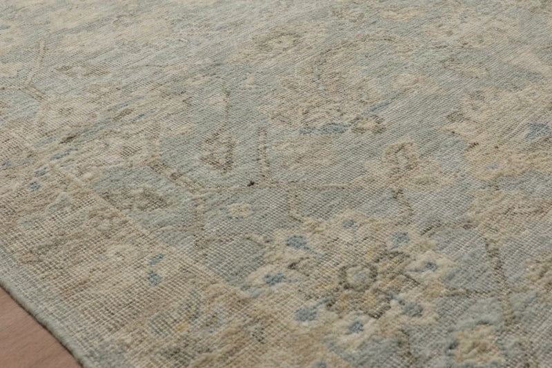 The Legacy Lagoon rug from Loloi is hand-knotted, refined, yet versatile for any home. The Legacy rug is deliberately distressed and sheared down to an extra low pile of 100% wool, creating a patina usually only imparted through decades of wear.  This rug features: - Beautiful vintage look and patina - Extra low pile - Easy to clean and maintain - Perfect for living and dining rooms, hallways, and extra large spaces  Hand-Knotted 100% Wool LZ-04 Lagoon