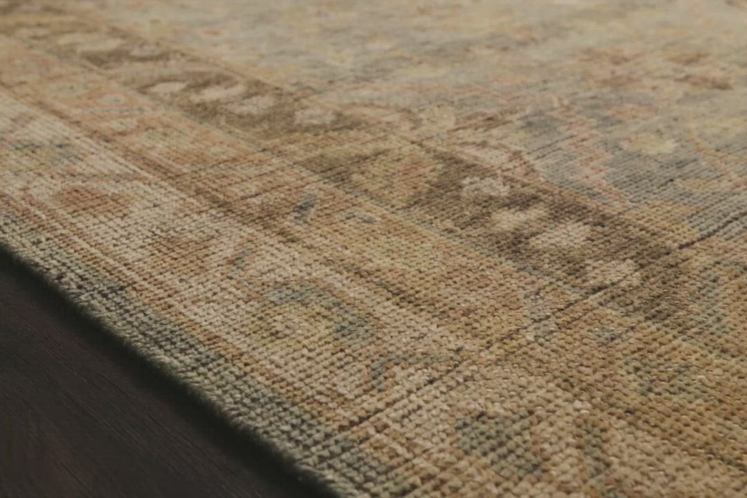 Load video: Bring a touch of antiqued beauty into your home with the Heirloom Aqua / Terracotta HQ-04 rug from Loloi. This wool rug tastefully honors the art of hand knotted rugs. This rug would be perfect for a living room, dining room, bedroom, hallway or kitchen runner with it&#39;s patterns and calming tones for your home.