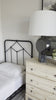 Vintage style for a classic bedroom look.  Durable, heavy iron makes for a supportive, wiggle-free bed. Amethyst Home provides interior design, new home construction design consulting, vintage area rugs, and lighting in the Nashville metro area.