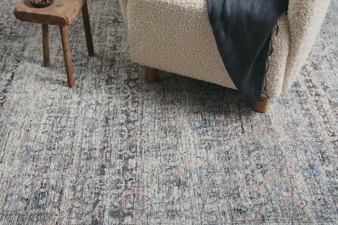 Touting richly saturated colors and a distressed pattern, the Billie Collection captures the look of a well-worn antique rug at a remarkable value. Reminiscent of one-of-a-kind rugs, this Amber Lewis x Loloi collection features random variations in color that render no two pieces exactly alike, creating up to 30% variance in color.  BIL-05 AL Denim / Blush