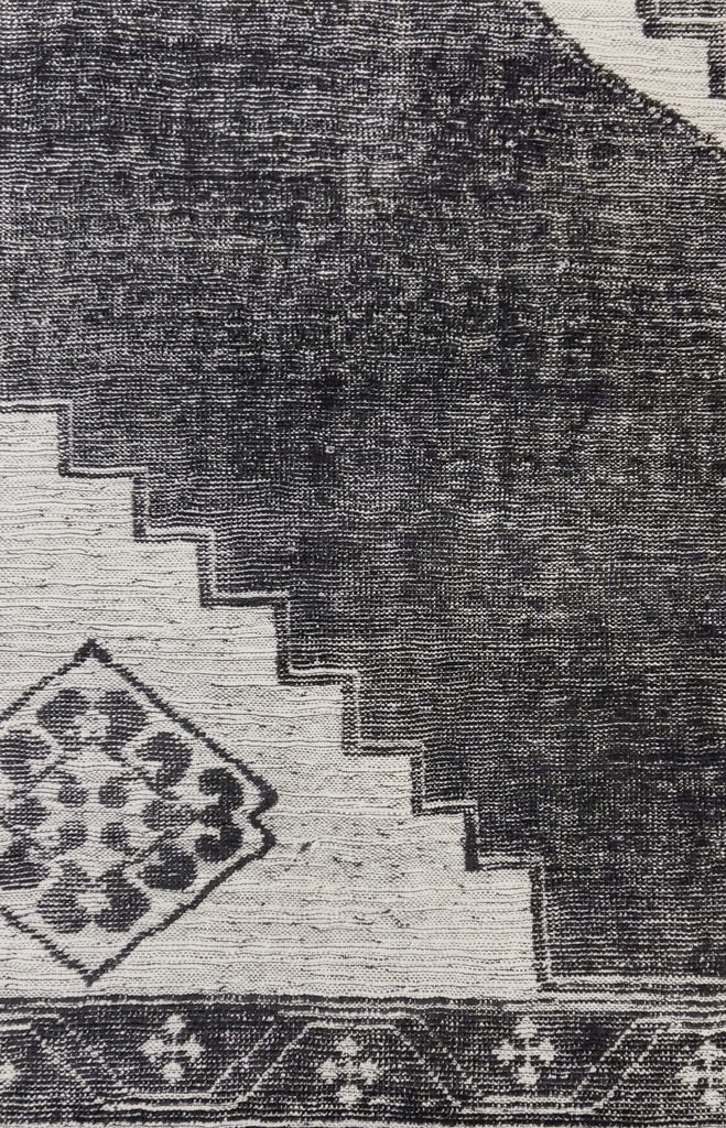 The Zahra Black hand-knotted rug by Surya showcases traditional inspired designs that exemplify timeless styles of elegance, comfort, and sophistication. Amethyst Home provides interior design, new construction, custom furniture, and area rugs in the Omaha metro area.