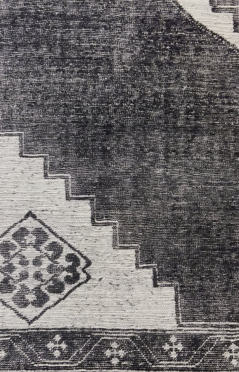 The Zahra Black hand-knotted rug by Surya showcases traditional inspired designs that exemplify timeless styles of elegance, comfort, and sophistication. Amethyst Home provides interior design, new construction, custom furniture, and area rugs in the Omaha metro area.