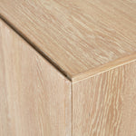 We love the grained matte finish on this Mika Washed Oak Veneer Dining Sideboard. The shelves make this the perfect sideboard for a functional, modernly attractive piece to add to your dining room  Size:  72.00"w x 16.00"d x 30.00"h Materials: Oak Veneer