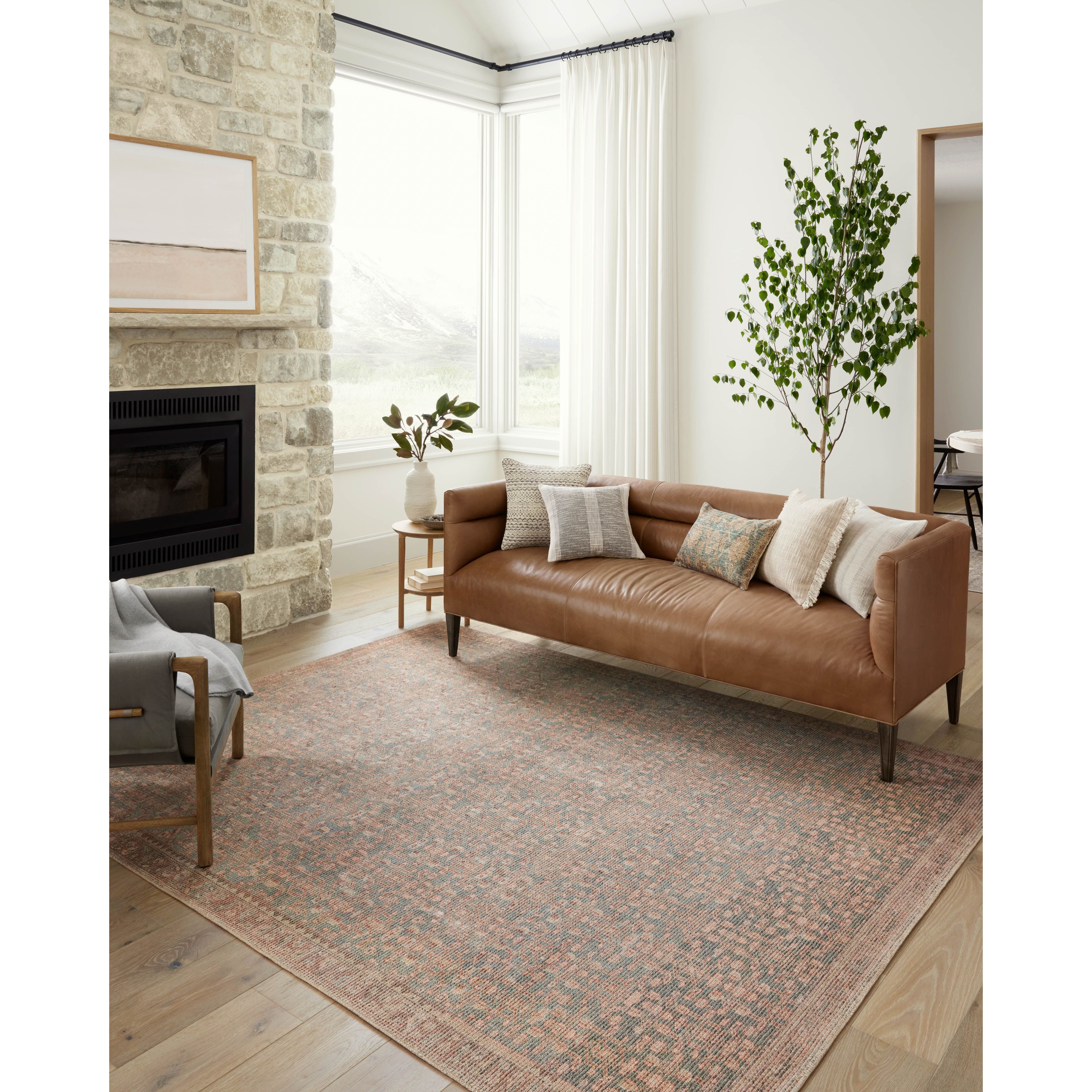 Featuring Angela Rose x Loloi Aubrey Blue / Terracotta Rug by Loloi at Amethyst Home. The Angela Rose x Loloi Aubrey Blue / Terracotta rug is the vintage-inspired area rug that makes visitors do double takes. The distressed pattern is printed with uncanny precision, while the ombre-fading and warm palette create an inviting, lived-in look. This is an incredibly versatile rug for busy living. Amethyst Home provides interior design services, furniture, rugs, and lighting in the Nashville metro area.