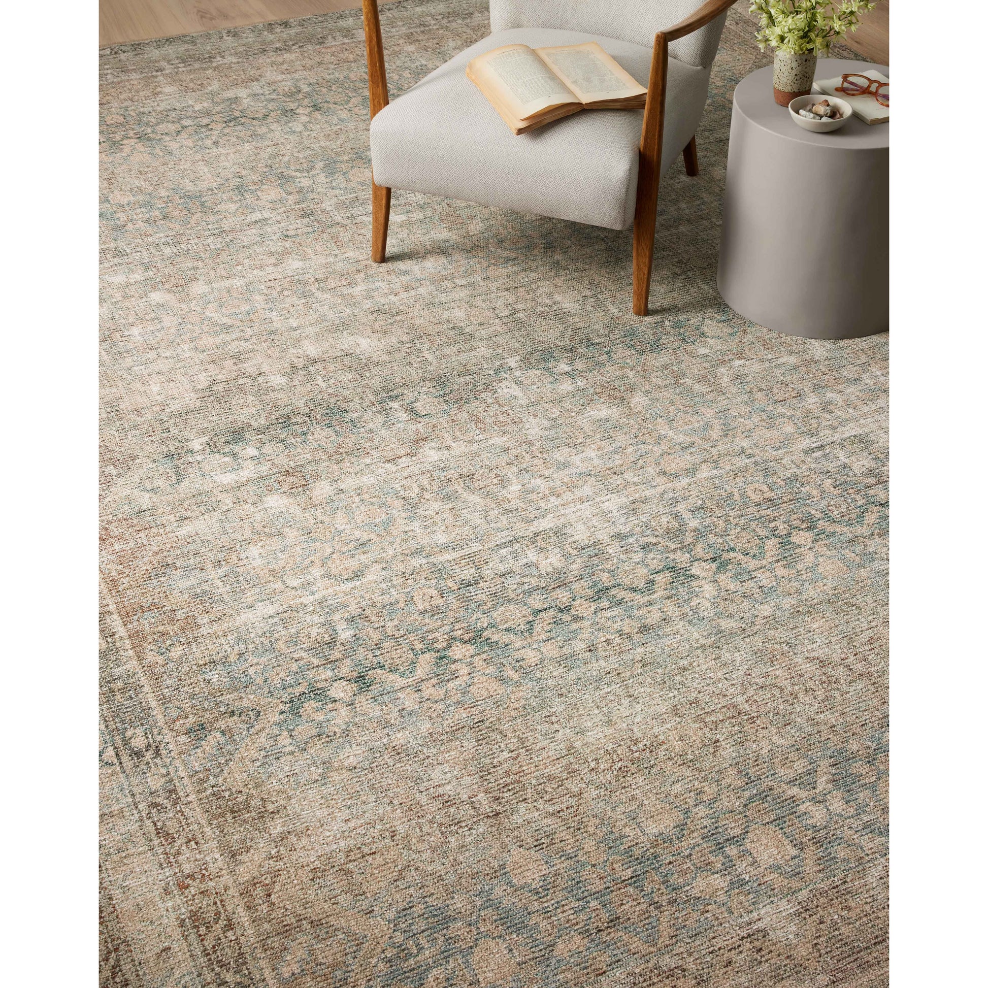 The Angela Rose x Loloi Aubrey AUB-03 Jade / Natural rug is the vintage-inspired area rug that makes visitors do double takes. The distressed pattern is printed with uncanny precision, while the ombre-fading and warm palette create an inviting, lived-in look. Amethyst favorite! Amethyst Home provides interior design services, furniture, rugs, and lighting in the Charlotte metro area.