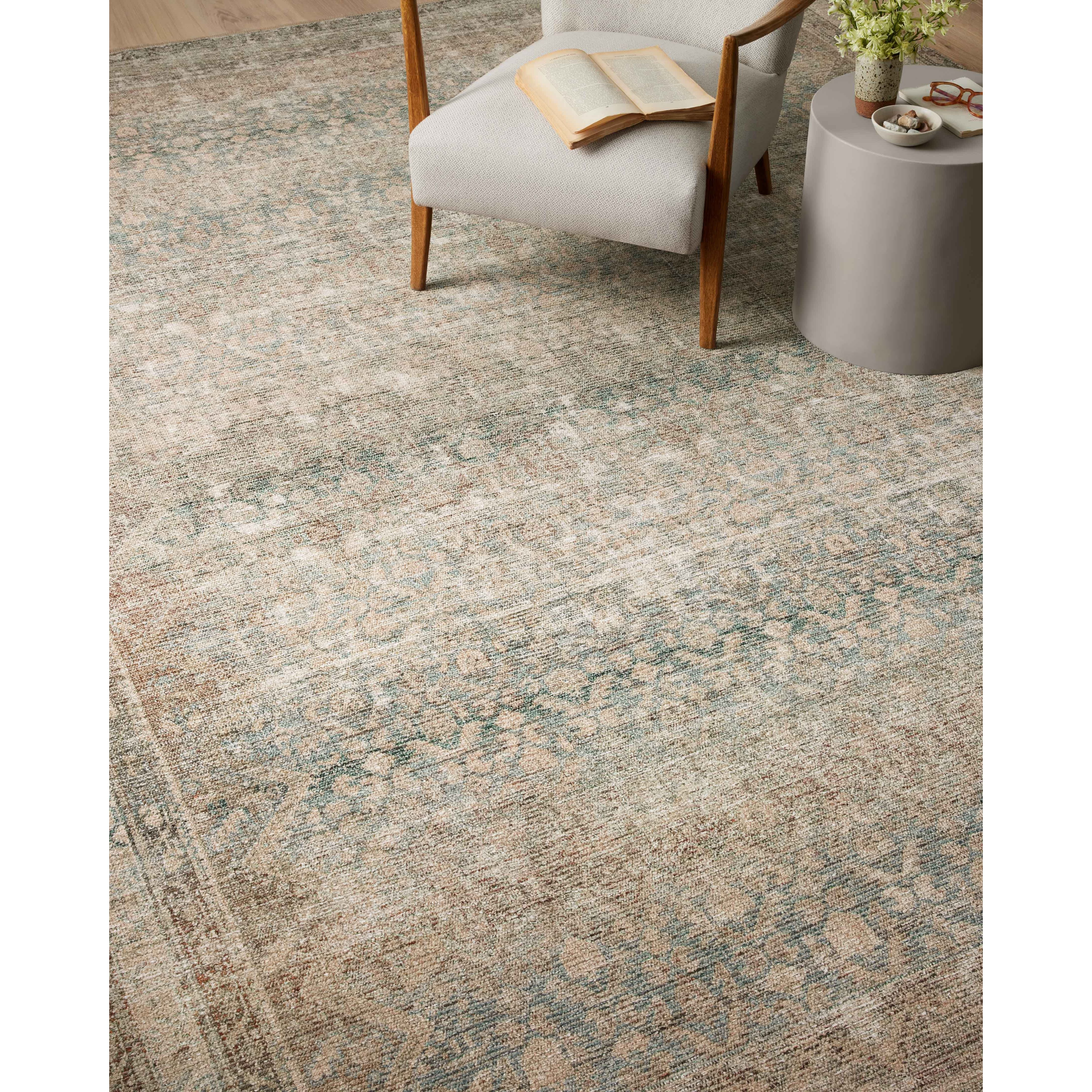The Angela Rose x Loloi Aubrey AUB-03 Jade / Natural rug is the vintage-inspired area rug that makes visitors do double takes. The distressed pattern is printed with uncanny precision, while the ombre-fading and warm palette create an inviting, lived-in look. Amethyst favorite! Amethyst Home provides interior design services, furniture, rugs, and lighting in the Charlotte metro area.