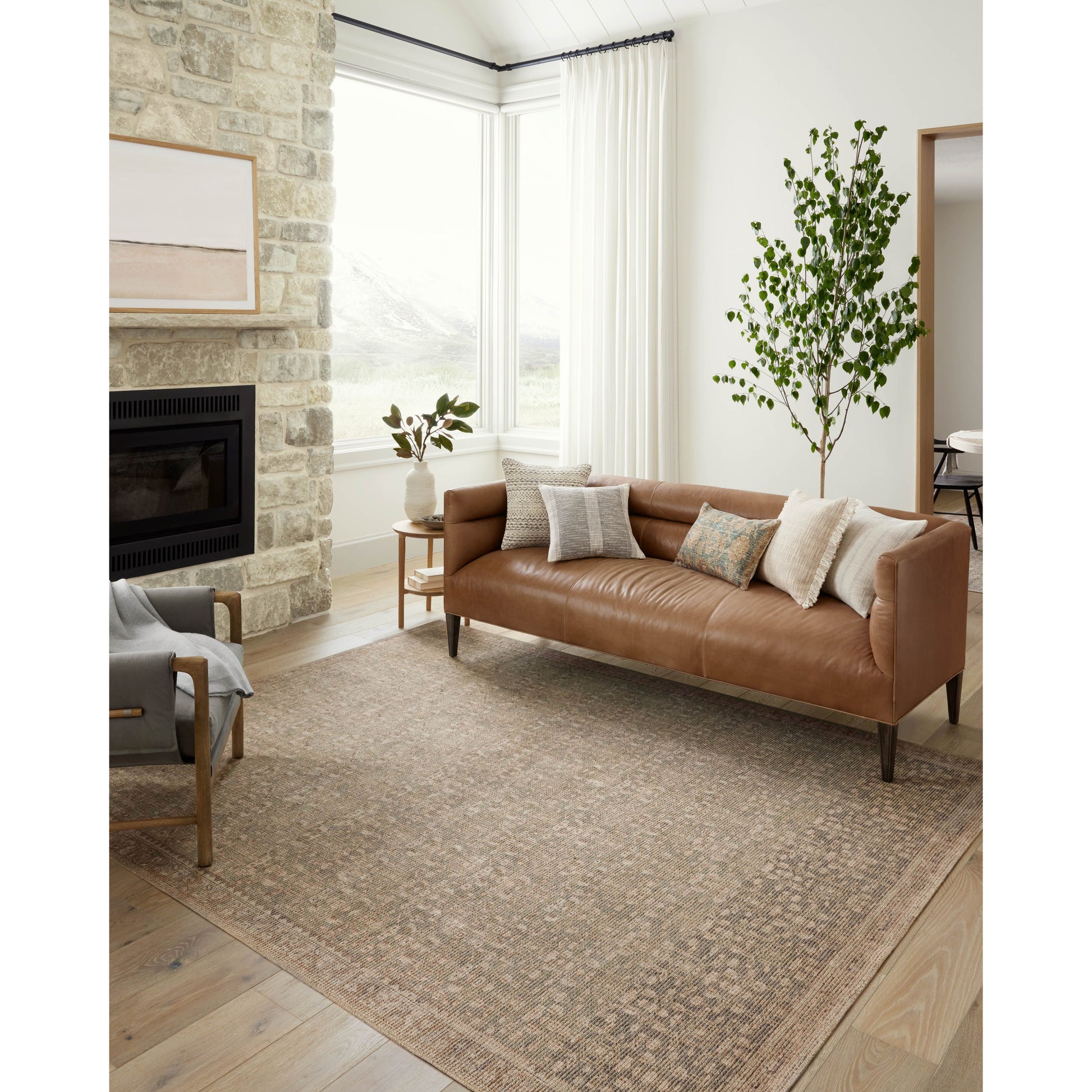The Angela Rose x Loloi Aubrey AUB-04 Sage / Bark rug is the vintage-inspired area rug that makes visitors do double takes. The distressed pattern is printed with uncanny precision, while the ombre-fading and warm palette create an inviting, lived-in look. Amethyst favorite! Amethyst Home provides interior design services, furniture, rugs, and lighting in the Phoenix metro area.