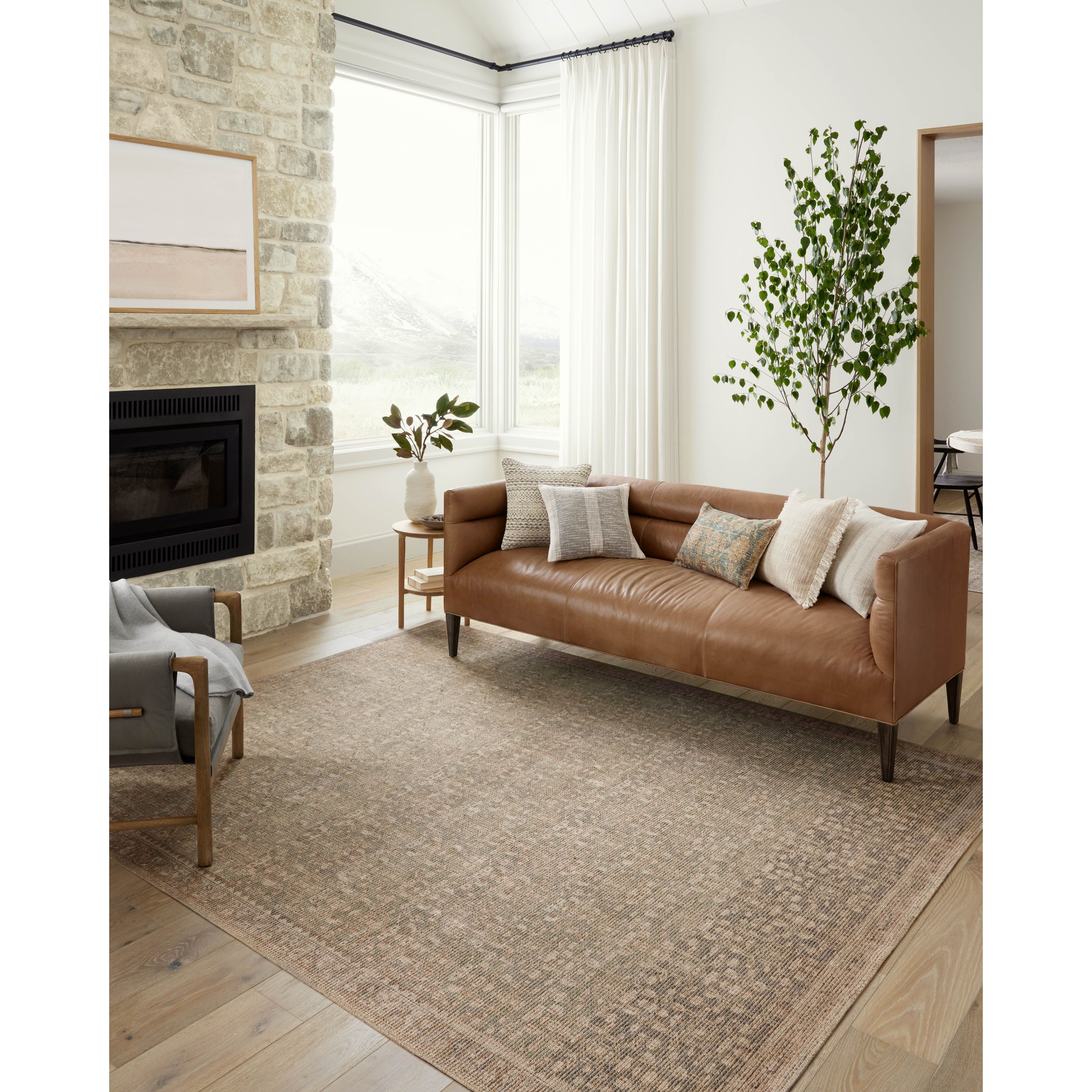 The Angela Rose x Loloi Aubrey AUB-04 Sage / Bark rug is the vintage-inspired area rug that makes visitors do double takes. The distressed pattern is printed with uncanny precision, while the ombre-fading and warm palette create an inviting, lived-in look. Amethyst favorite! Amethyst Home provides interior design services, furniture, rugs, and lighting in the Phoenix metro area.