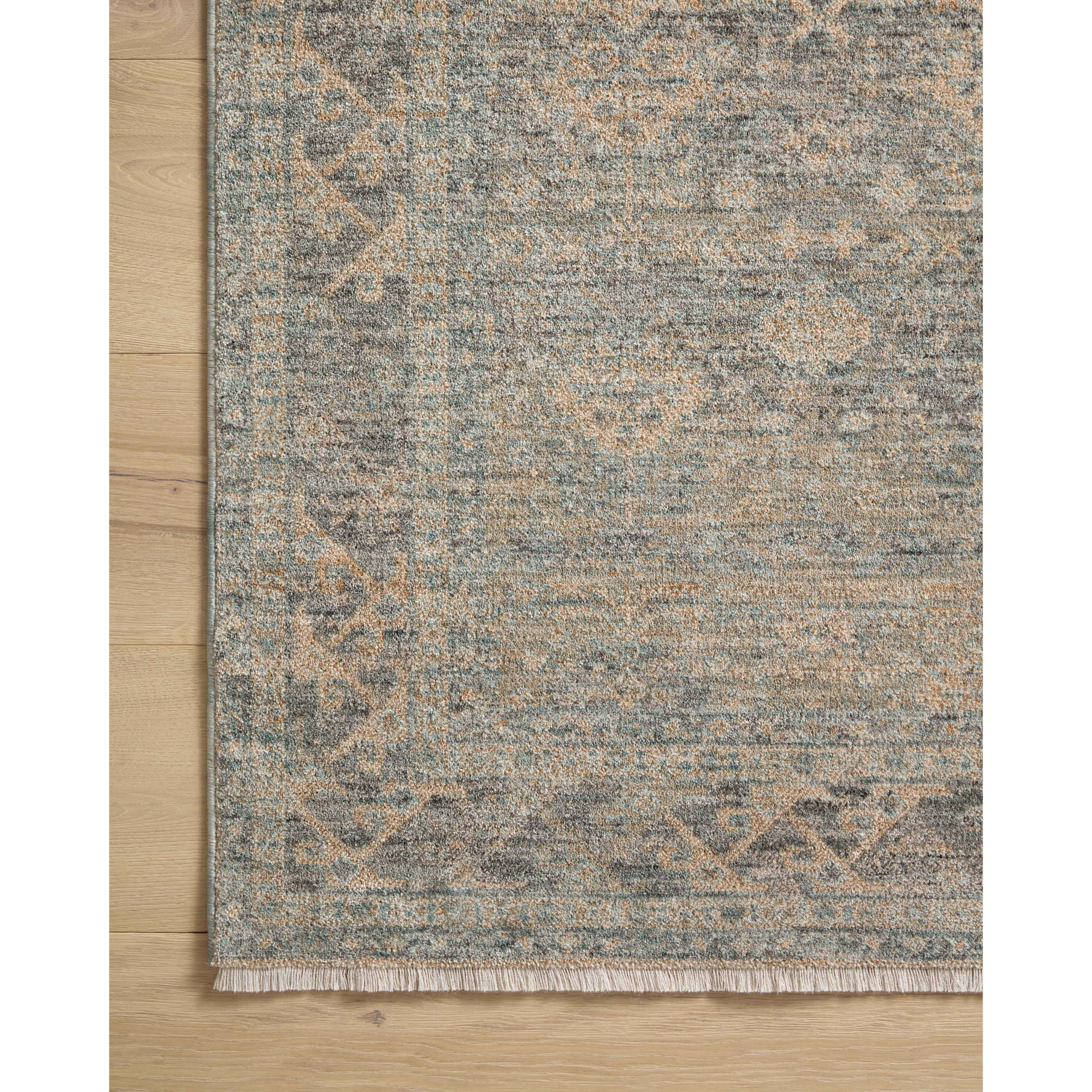 The Angela Rose x Loloi Blake BLA-01 Sky / Beige rug features traditional motifs that have softened into the background, making it an effortless neutral in any room. Muted earth-toned palettes complement a range of furniture, while subtle cream-colored fringe at the edges add texture and framing. Amethyst favorite! Amethyst Home provides interior design services, furniture, rugs, and lighting in the Alpharetta metro area.