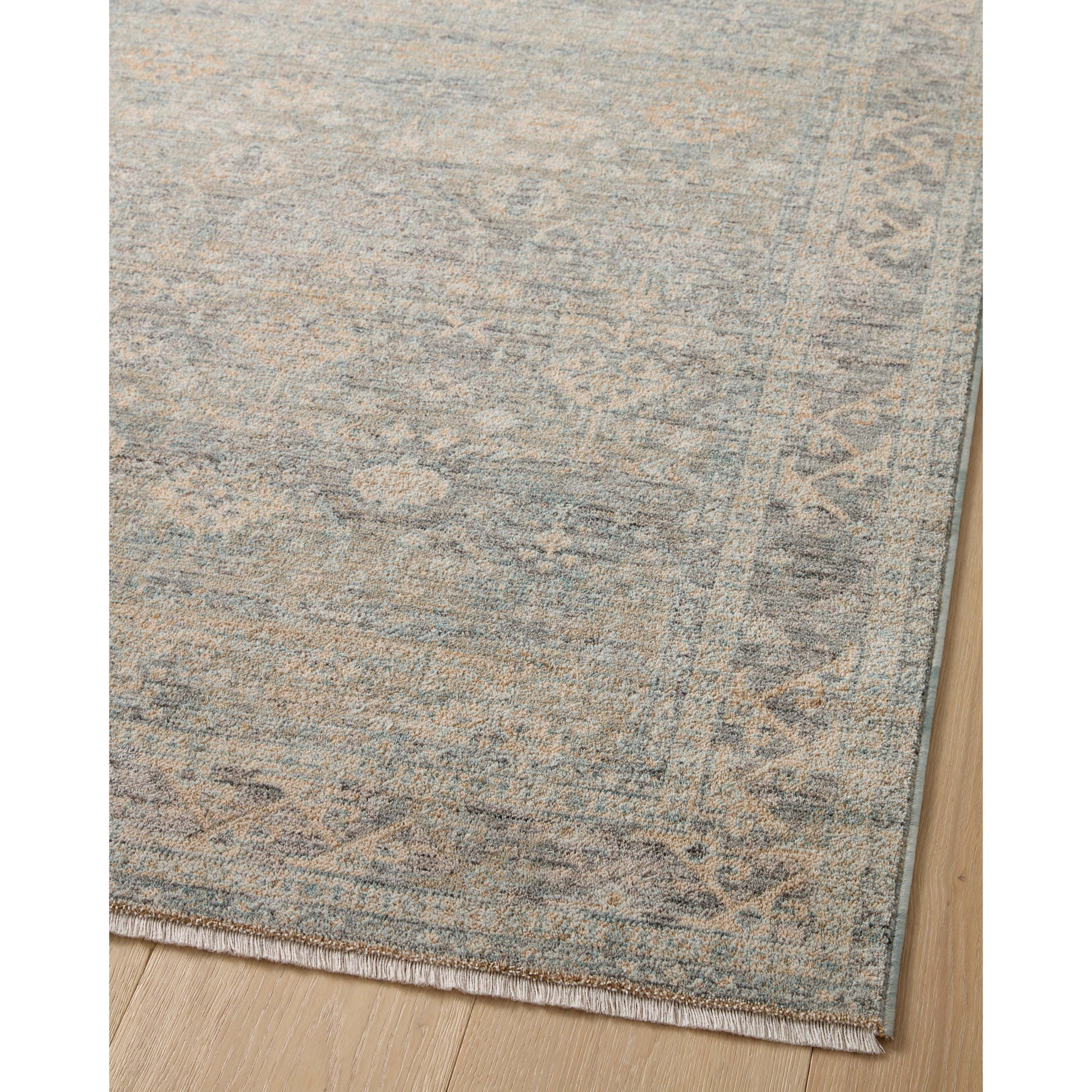 The Angela Rose x Loloi Blake BLA-01 Sky / Beige rug features traditional motifs that have softened into the background, making it an effortless neutral in any room. Muted earth-toned palettes complement a range of furniture, while subtle cream-colored fringe at the edges add texture and framing. Amethyst favorite! Amethyst Home provides interior design services, furniture, rugs, and lighting in the Chicago metro area.