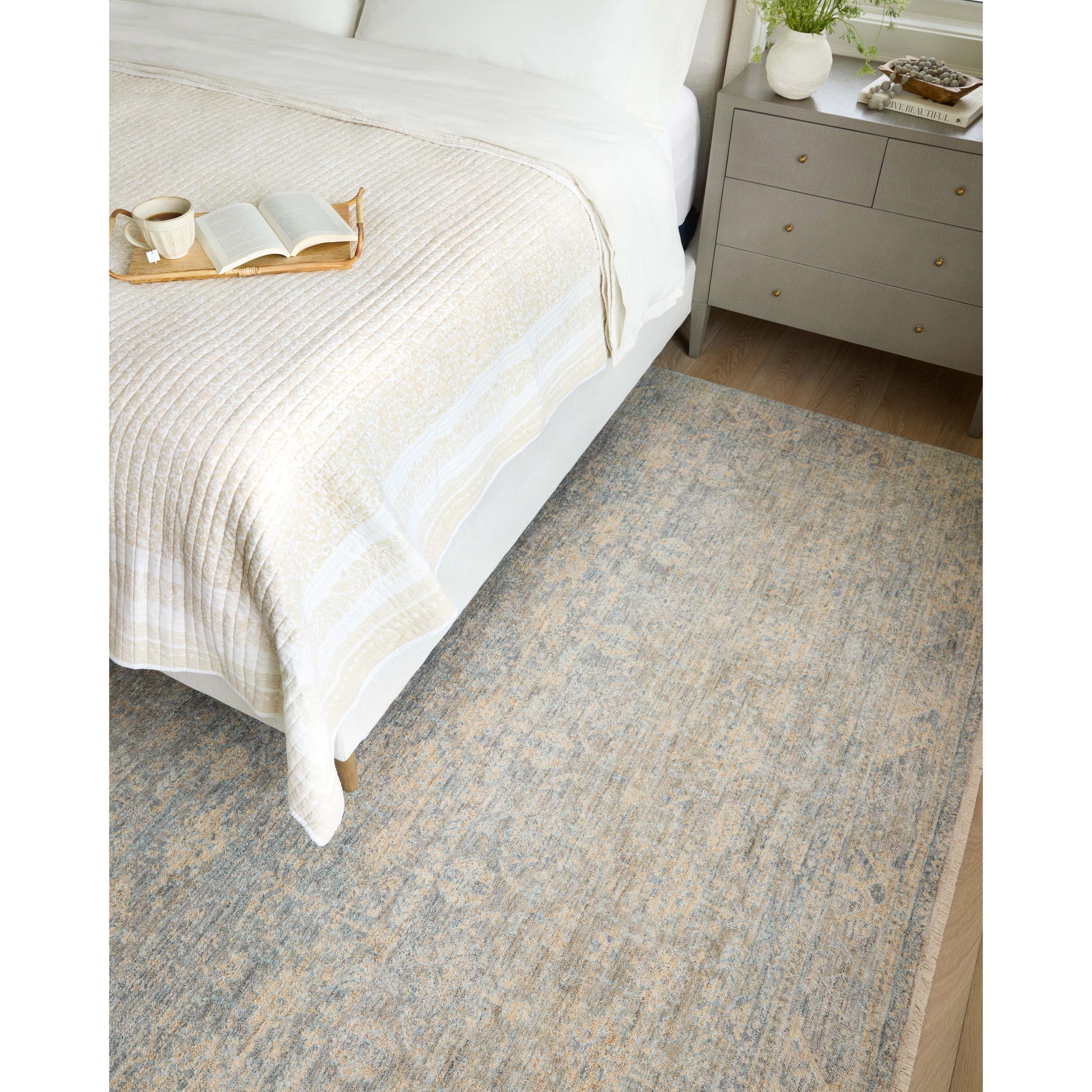 The Angela Rose x Loloi Blake BLA-01 Sky / Beige rug features traditional motifs that have softened into the background, making it an effortless neutral in any room. Muted earth-toned palettes complement a range of furniture, while subtle cream-colored fringe at the edges add texture and framing. Amethyst favorite! Amethyst Home provides interior design services, furniture, rugs, and lighting in the Kansas City metro area.