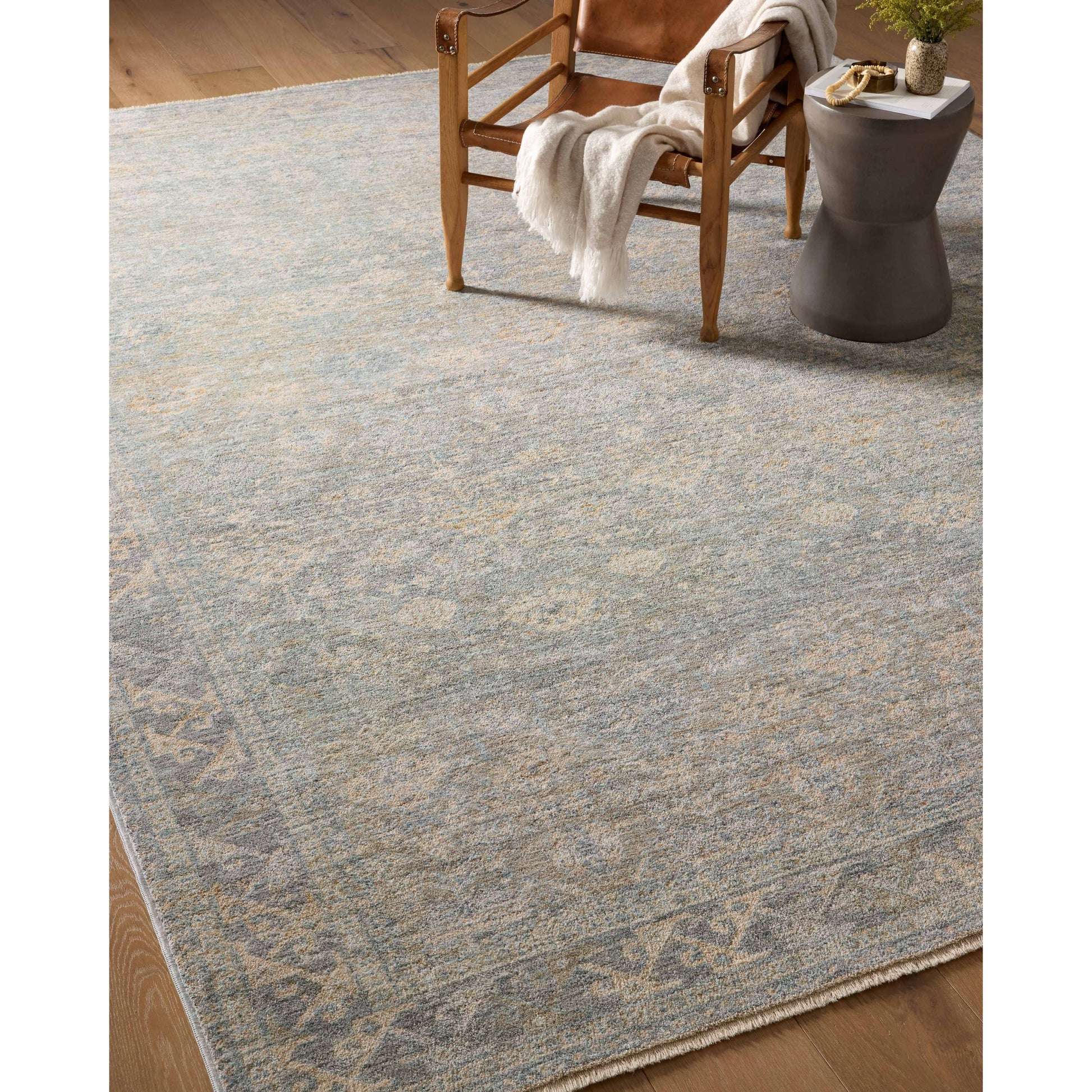 The Angela Rose x Loloi Blake BLA-01 Sky / Beige rug features traditional motifs that have softened into the background, making it an effortless neutral in any room. Muted earth-toned palettes complement a range of furniture, while subtle cream-colored fringe at the edges add texture and framing. Amethyst favorite! Amethyst Home provides interior design services, furniture, rugs, and lighting in the Tulsa metro area.