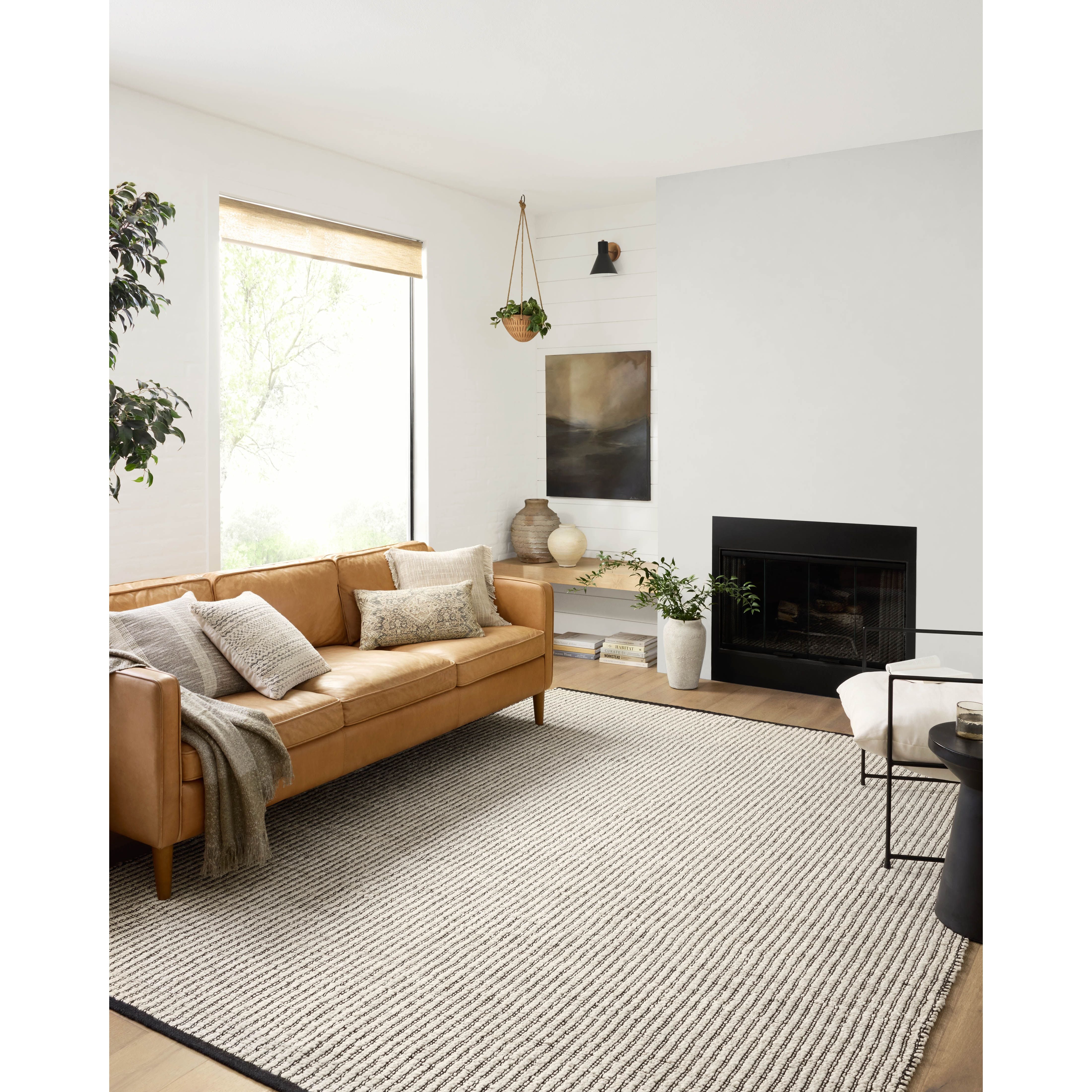 Featuring Angela Rose x Loloi Colton Ivory / Black Rug by Loloi at Amethyst Home. The Angela Rose x Loloi Colton Ivory / Black rug is a new take on the staple jute rug, blended with cotton for added softness. In a range of linear designs in modern earth tones, Colton can add visual interest to a room or serve as a gently textured neutral. This collection is hand-woven in India and GoodWeave ce. Amethyst Home provides interior design services, furniture, rugs, and lighting in the Dallas metro area.