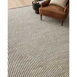 Featuring Angela Rose x Loloi Colton Ivory / Black Rug by Loloi at Amethyst Home. The Angela Rose x Loloi Colton Ivory / Black rug is a new take on the staple jute rug, blended with cotton for added softness. In a range of linear designs in modern earth tones, Colton can add visual interest to a room or serve as a gently textured neutral. This collection is hand-woven in India and GoodWea. Amethyst Home provides interior design services, furniture, rugs, and lighting in the Winter Park metro area.