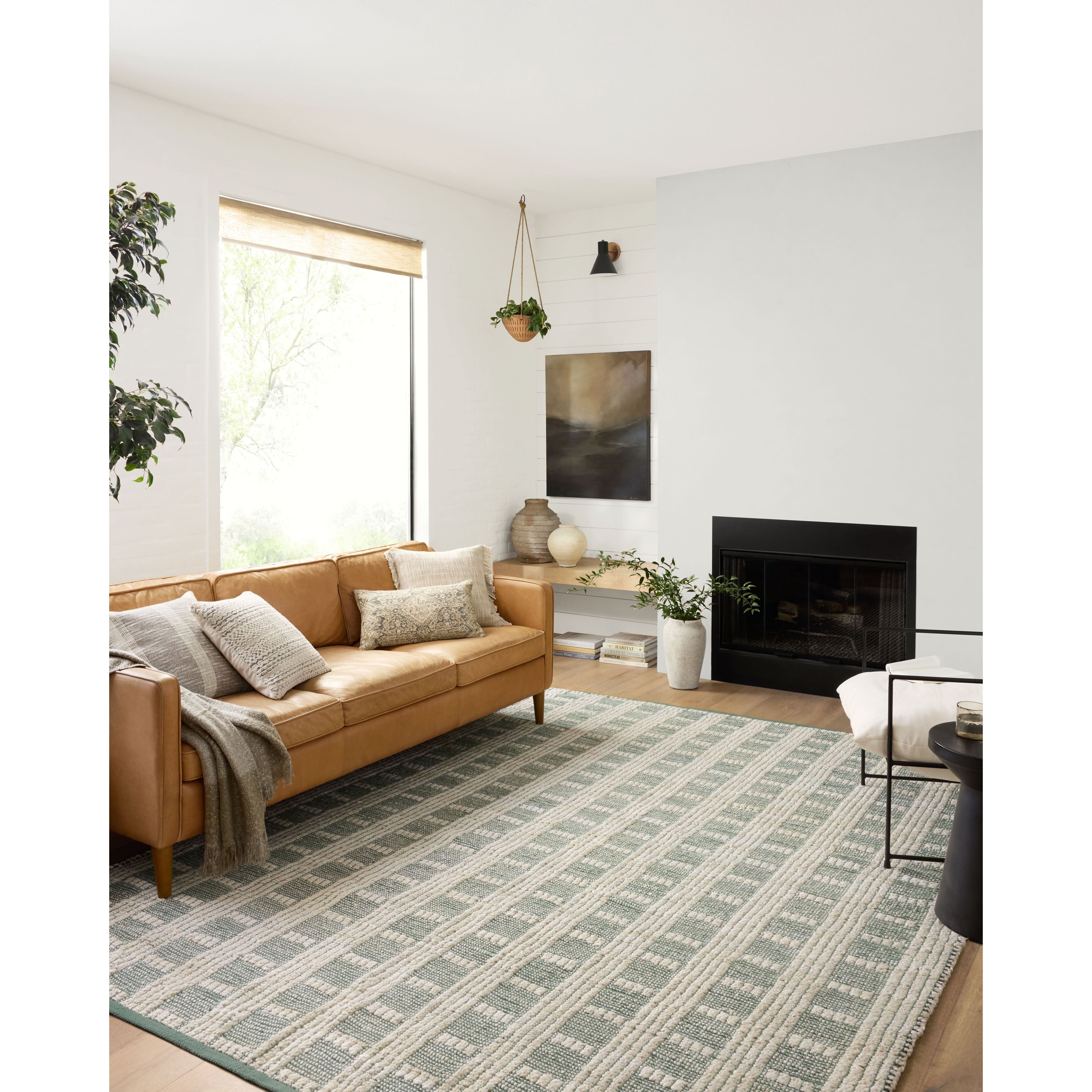 Featuring Angela Rose x Loloi Colton Ivory / Sage Rug by Loloi at Amethyst Home. The Angela Rose x Loloi Colton Ivory / Sage rug is a new take on the staple jute rug, blended with cotton for added softness. In a range of linear designs in modern earth tones, Colton can add visual interest to a room or serve as a gently textured neutral. This collection is hand-woven in India and GoodWeave cert. Amethyst Home provides interior design services, furniture, rugs, and lighting in the Denver metro area.