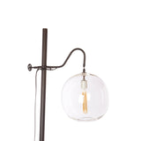 The Aurora Lamp from Cisco Brothers adds a chic light to any room. Each lamp is hand blown glass and can vary up to 1" in size. The light fixture can be height adjusted upon the metal rod to fit right where you need it. The lamp can come in a globe, bailey medium lamp, or bailey small lamp.