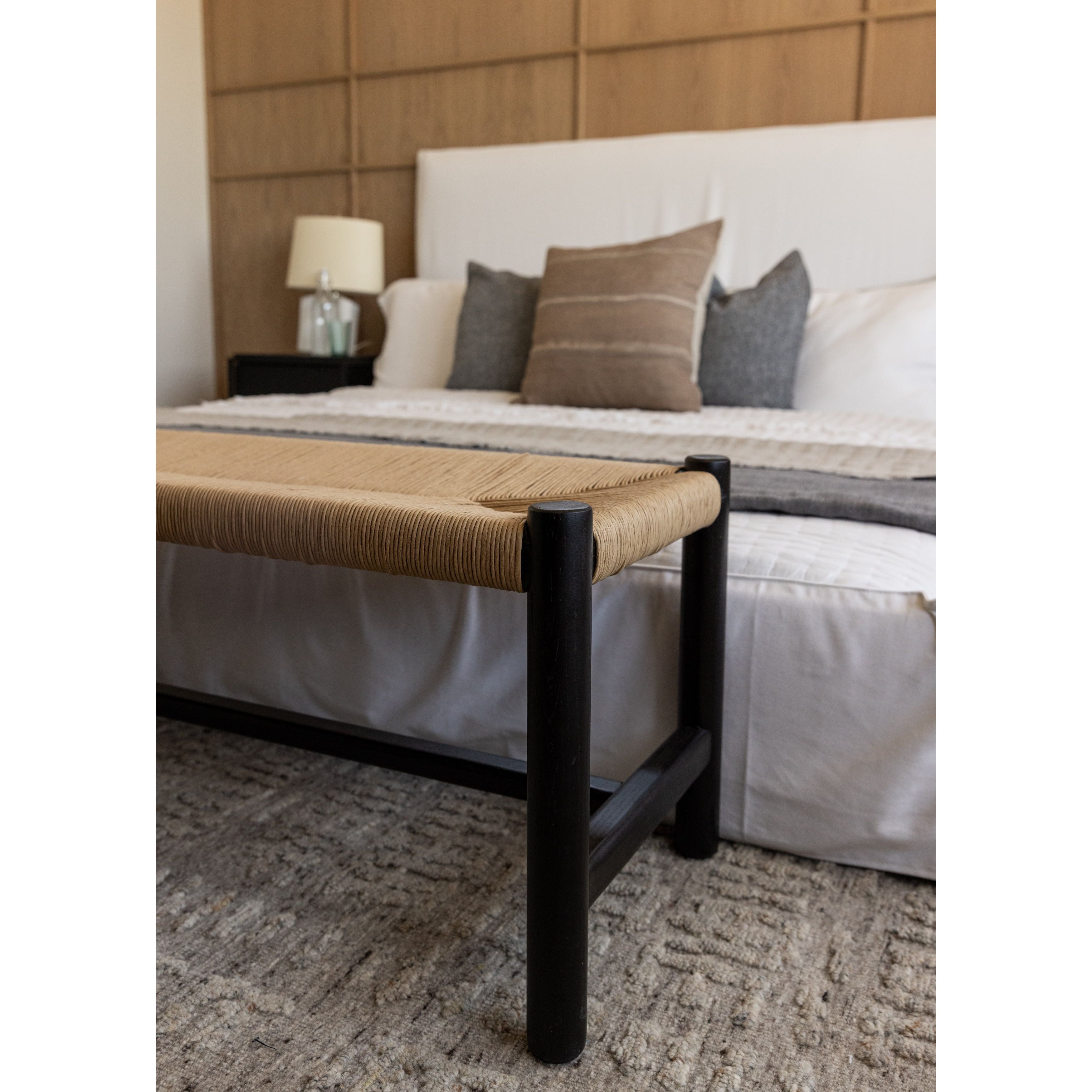Cisco Brothers April Bed is designed and constructed in Los Angeles. The pinched edges and clean lines bring a modern, minimalist feel to any bedroom. Photographed in White Denim and Bengal Pin Striped Indigo. Amethyst Home provides interior design, new home construction design consulting, vintage area rugs, and lighting in the Nashville metro area.