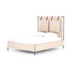 Safari styling gets a modern reboot with this Leigh Upholstered Bed. Linen-blend upholstery of neutral taupe lays a texture-rich base for a forward-thinking bedroom look. Brown leather straps secure decorative headboard pillows, suspended for eye-catching effect. Box spring required.