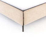 Safari styling gets a modern reboot with this Leigh Upholstered Bed. Linen-blend upholstery of neutral taupe lays a texture-rich base for a forward-thinking bedroom look. Brown leather straps secure decorative headboard pillows, suspended for eye-catching effect. Box spring required.