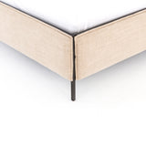Safari styling gets a modern reboot with this Leigh Upholstered Bed. Linen-blend upholstery of neutral taupe lays a texture-rich base for a forward-thinking bedroom look. Brown leather straps secure decorative headboard pillows, suspended for eye-catching effect. Box spring required.