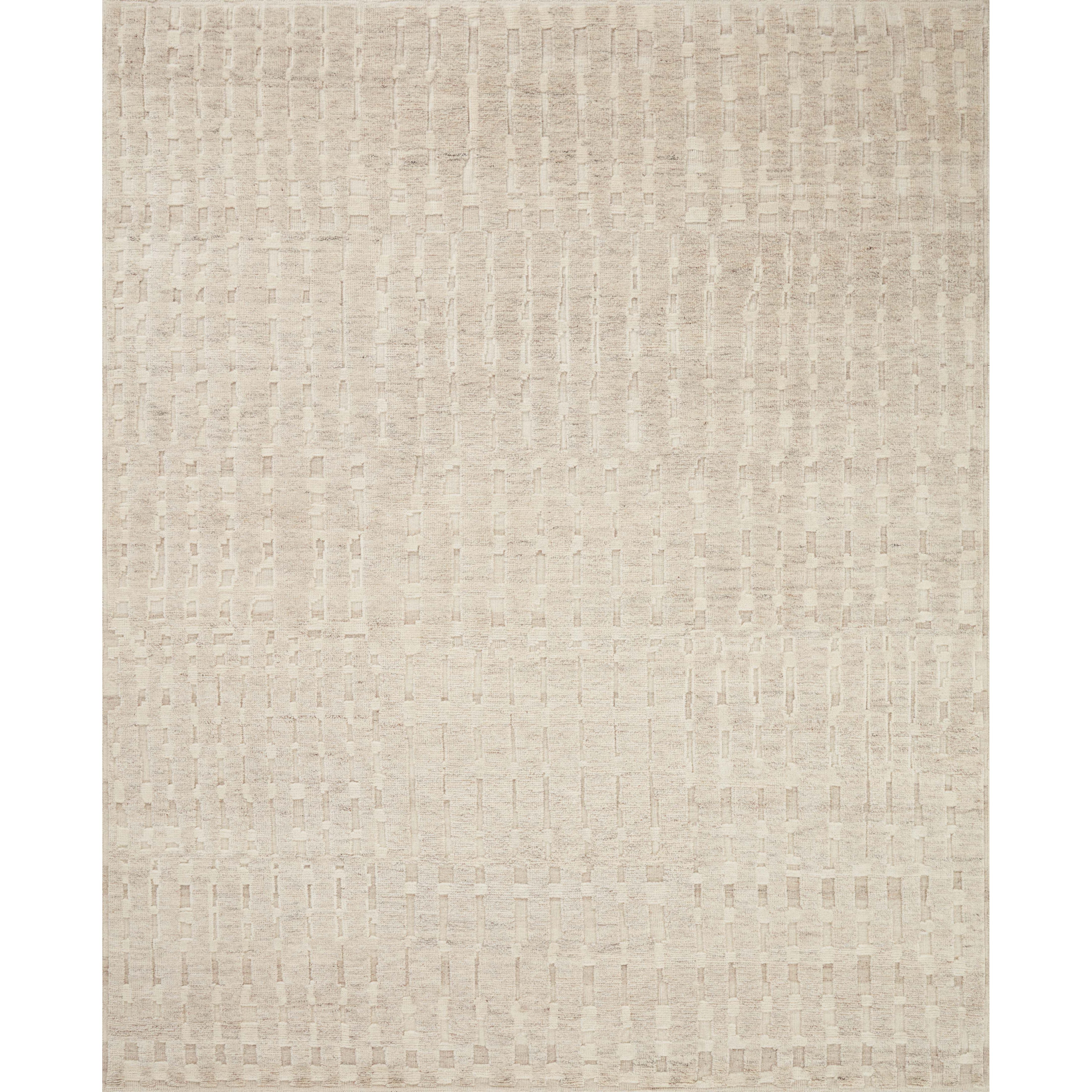 The Moore Collection for Carrier and Company x Loloi is a sophisticated area rug with a subtle interplay of higher, lighter tone pile above a deeper-toned base pile. Abstract geometric patterns in airy, neutral palettes create a sense of freshness and textured dimension that the design firm is known for, especially against the rug’s striped base. AmethystHome provides interior design, new construction, custom furniture, and rugs for Boston metro area