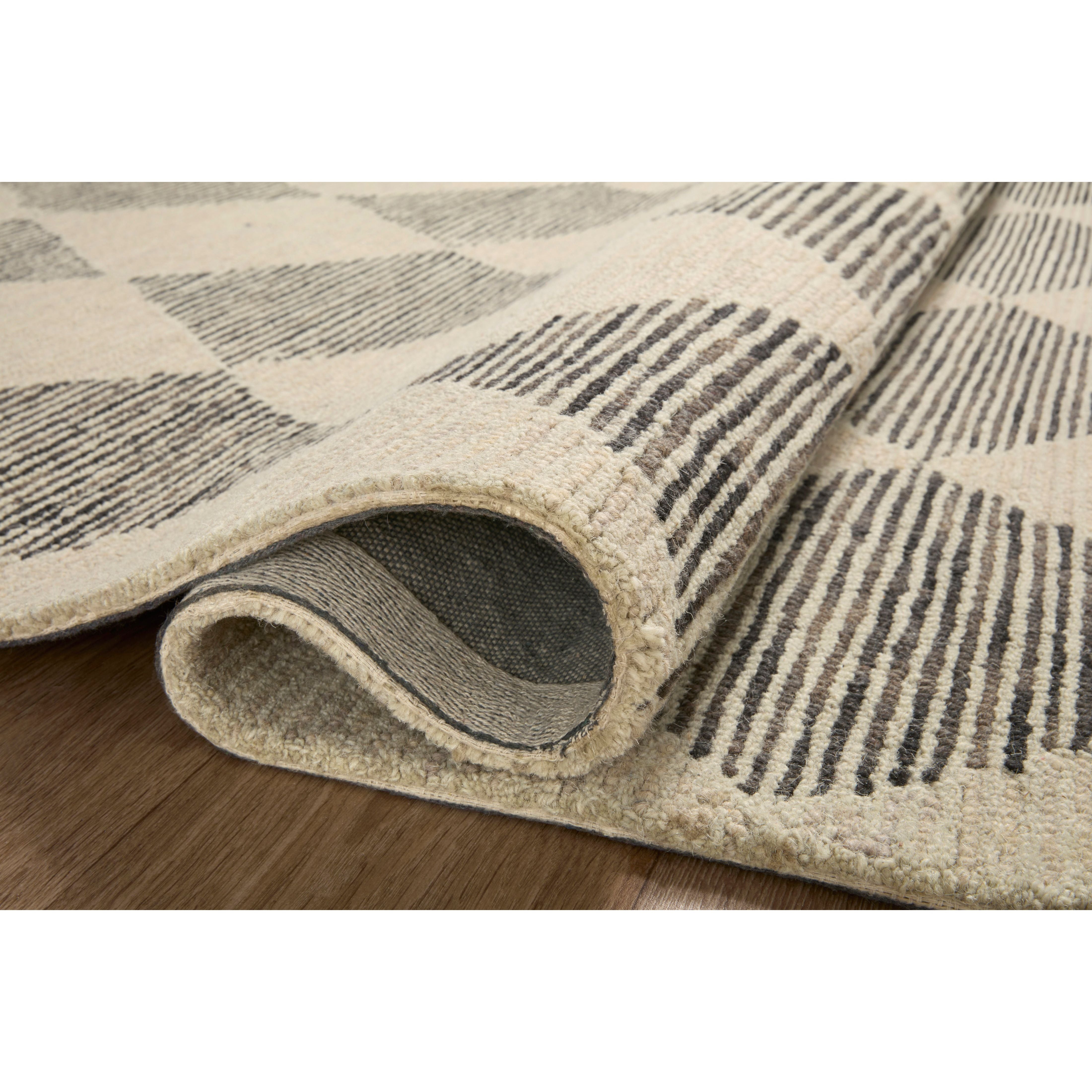 Featuring Chris Loves Julia x Loloi Francis Beige / Charcoal Rug by Loloi at Amethyst Home. Balancing a matte wool look with a bit of sheen — the Francis rug is a beautiful ode to Julia Marcum’s signature tile work. Perfectly neutral — this rug mixes old traditions with fresh modern sensibility.
It’s no coincidence that the pattern of the Francis Beige / Charcoal rug for Chris Loves Ju. Amethyst Home provides interior design services, furniture, rugs, and lighting in the Salt Lake City metro area.