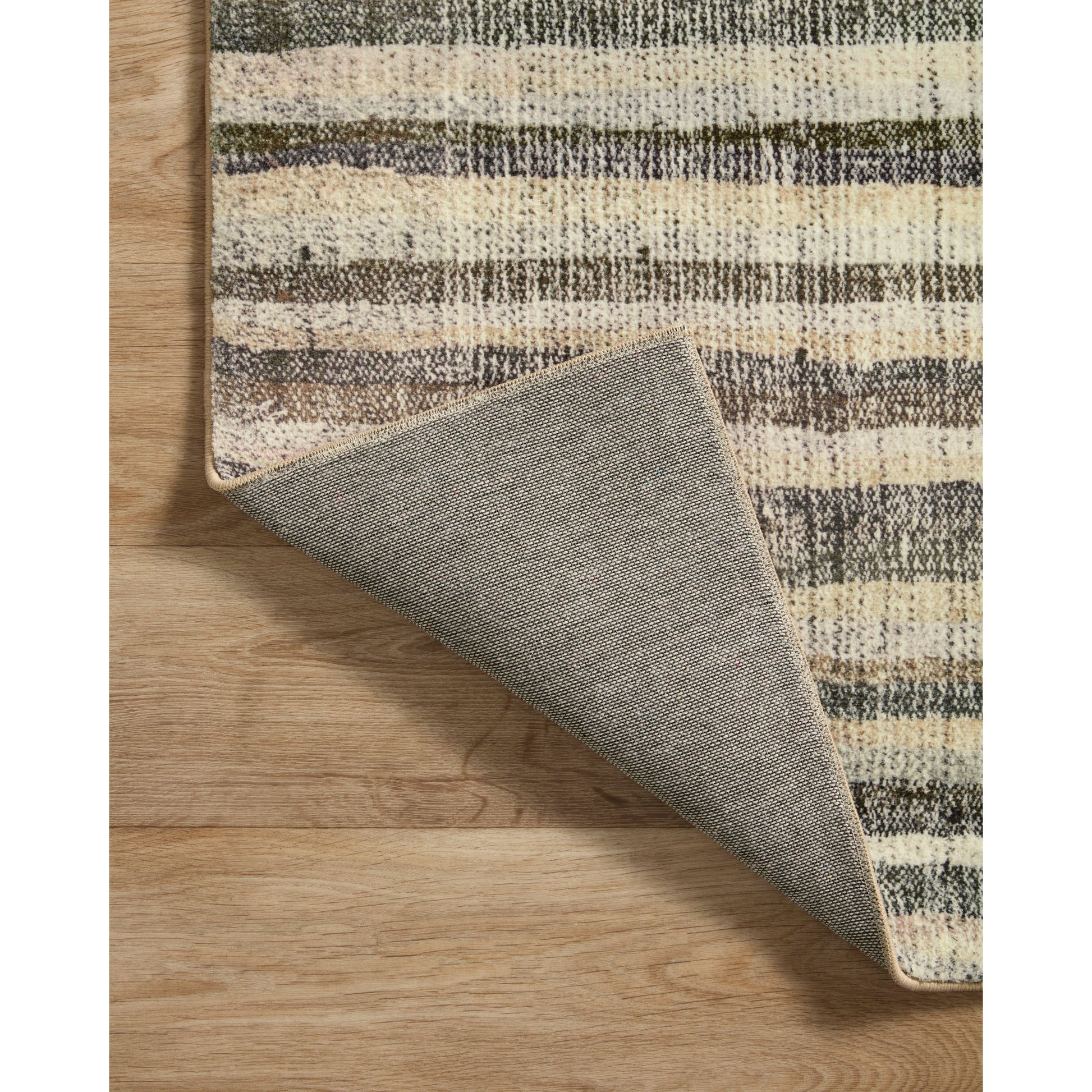 Blending vintage + modern, the Humphrey Natural / Moss rug looks beautiful with dark toned woods, moody walls, and heirloom pieces. Made of a dreamy cloud-pile texture that mimics the soft pile of a sheepskin, it's an Amethyst favorite! Amethyst favorite! Amethyst Home provides interior design services, furniture, rugs, and lighting in the Seattle metro area.
