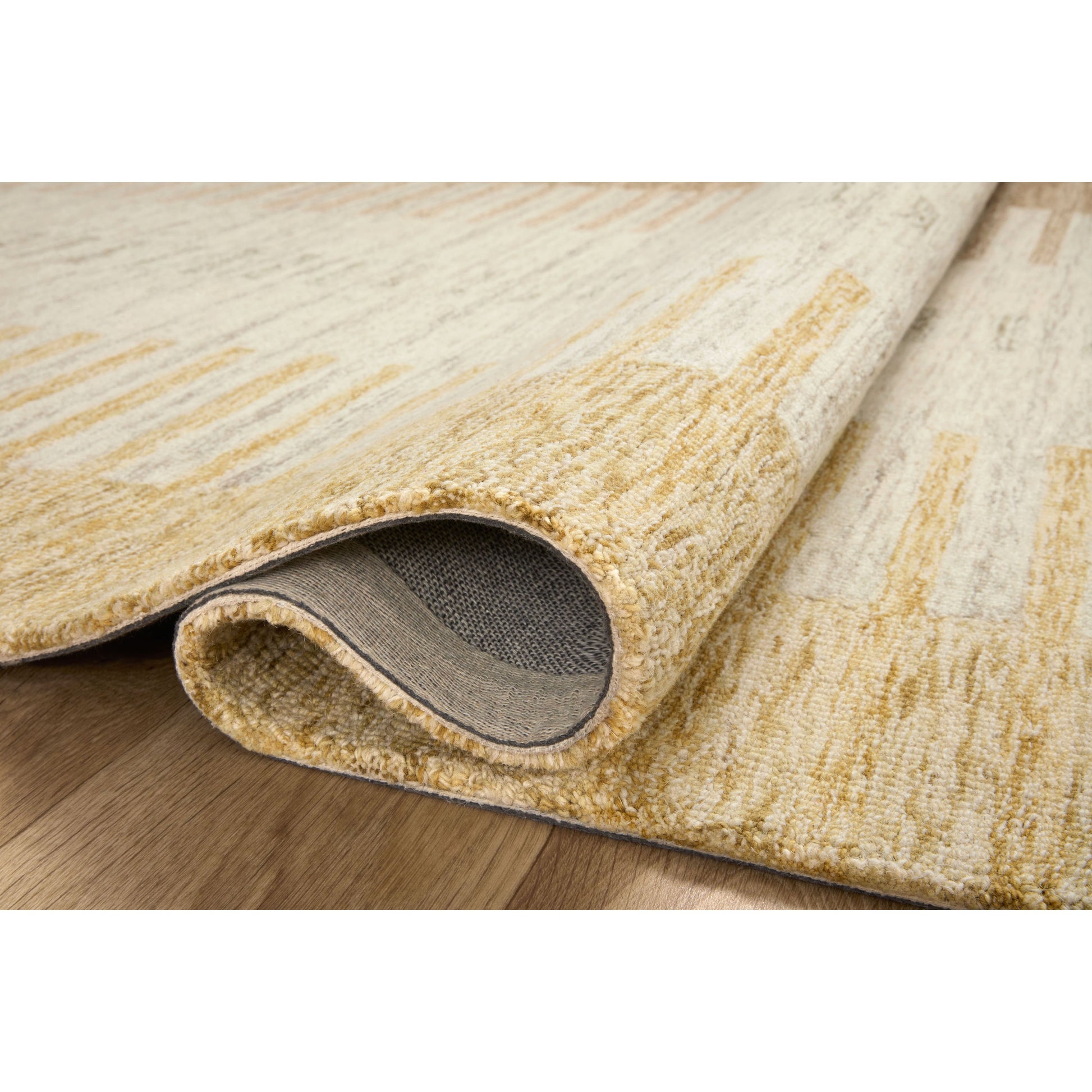 The Chris Dove / Santa Fe rug reminds us of our favorite casual, tonal stripe hemp rugs. Family friendly, hooked wool is a great choice for easy cleaning! Amethyst Home provides interior design services, furniture, rugs, and lighting in the Dallas metro area.