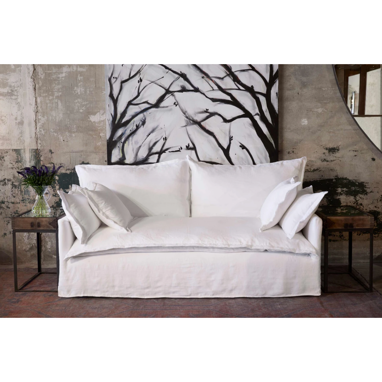 The Paloma Sofa from Cisco Brothers has a casual, chic look. This sofa brings a sense of comfort and ease into your space with its inviting design -- a perfect sofa to melt into after a long day. Photographed in Otis White. 