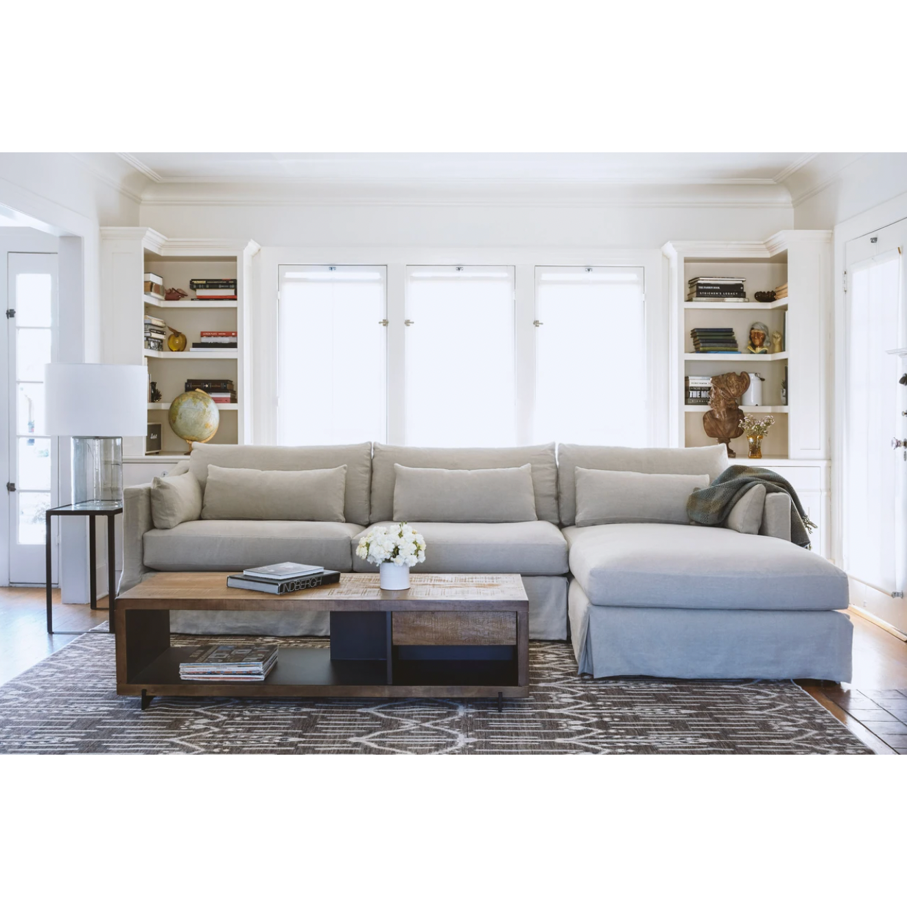 An Amethyst favorite, the Rebecca Deluxe 2pc Sectional by Cisco Brothers is the perfect piece to complete your living room. It’s base is a FSC certified Maple hardwood frame. This sectional has a luxurious feather cloud fill with a foam core, bringing relaxation and ease into your home. Photographed in Mariet Natural. 
