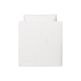 The Rebecca by Cisco Brothers has a stunning silhouette draped in a graceful slip skirt with a neat kick-pleat detail. With a lumbar pillow for extra comfort, this tranquil chair will bring relaxation and ease into your home. Photographed in Denim White.   Overall: 30"w x 35"d x 31"h