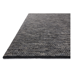 The Collins Amber Lewis x Loloi COI-01 AL Charcoal / Denim rug for Amber Lewis x Loloi is hand-knotted of wool and cotton by skilled artisans in India and GoodWeave-Certified. Collins features varying knotting techniques interwoven to create a uniquely texture pattern. Amethyst Home provides interior design, new construction, custom furniture, and rugs for the Austin, Texas metro area.