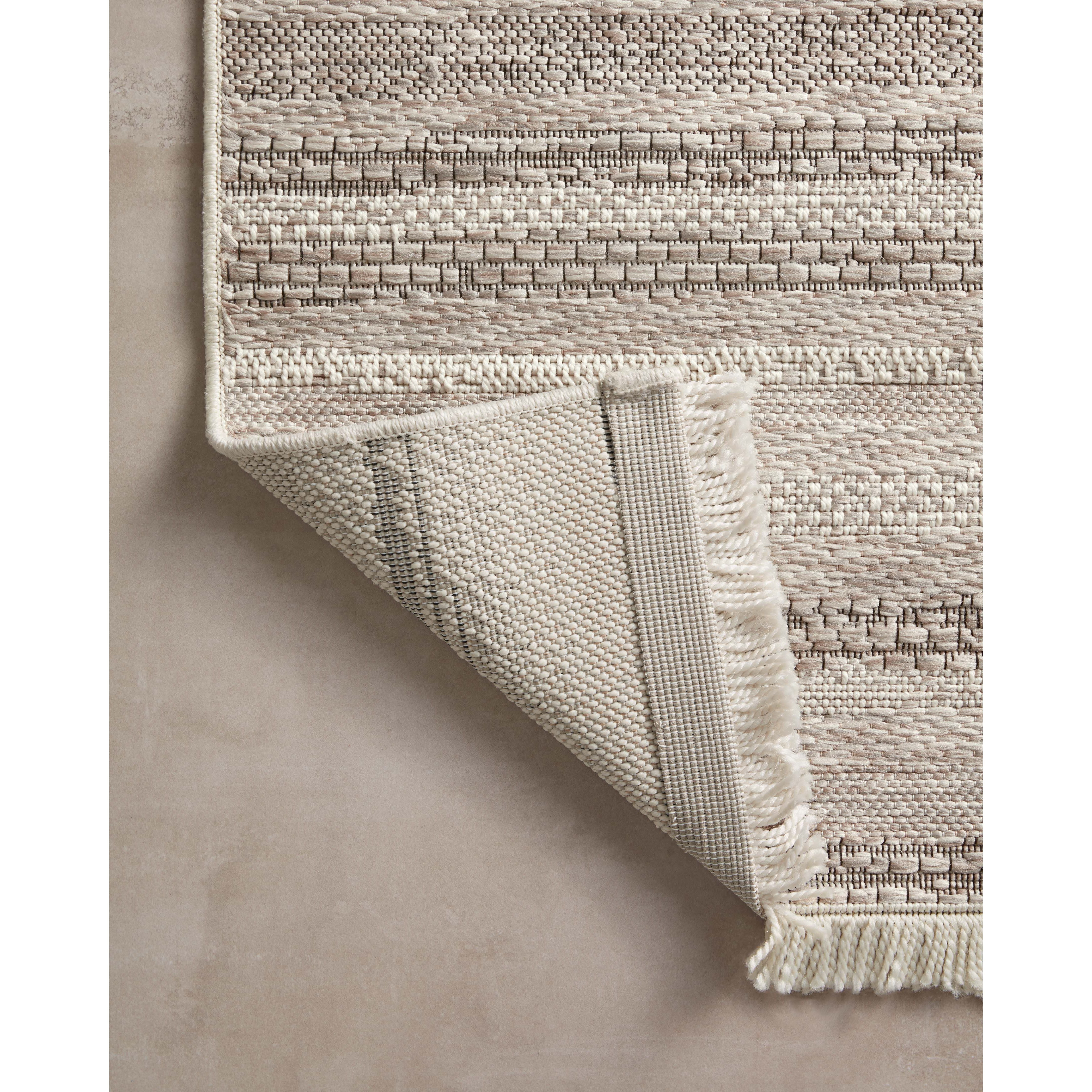 The Malibu Collection is an indoor/outdoor area rug by Amber Lewis x Loloi that channels the casual modern vibe of the beach city it’s named after. The rug’s neutral-toned geometric prints are easy to match with a range of decor styles, while a hint of fringe adds to the breezy aesthetic. Amethyst Home provides interior design, new construction, custom furniture, and area rugs in the Park City metro area.