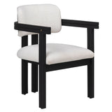 Experience the harmonious fusion of classic style and contemporary materials with our Nathaniel Dining Chair. Its black mindi wood frame seamlessly complements the uniquely textured off-white poly blend upholstery, creating a visually stunning combination. Amethyst Home provides interior design, new home construction design consulting, vintage area rugs, and lighting in the Nashville metro area.