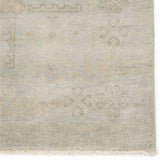 The Eloquent Chival Area Rug by Jaipur Living, or ELQ02, emanates traditional elegance, lending a soft and serene look to transitional homes. The hand-knotted Chival area rug features a washed vintage-inspired design in muted gray and beige tones. Perfect for the bedroom, living room, or other medium traffic areas. 