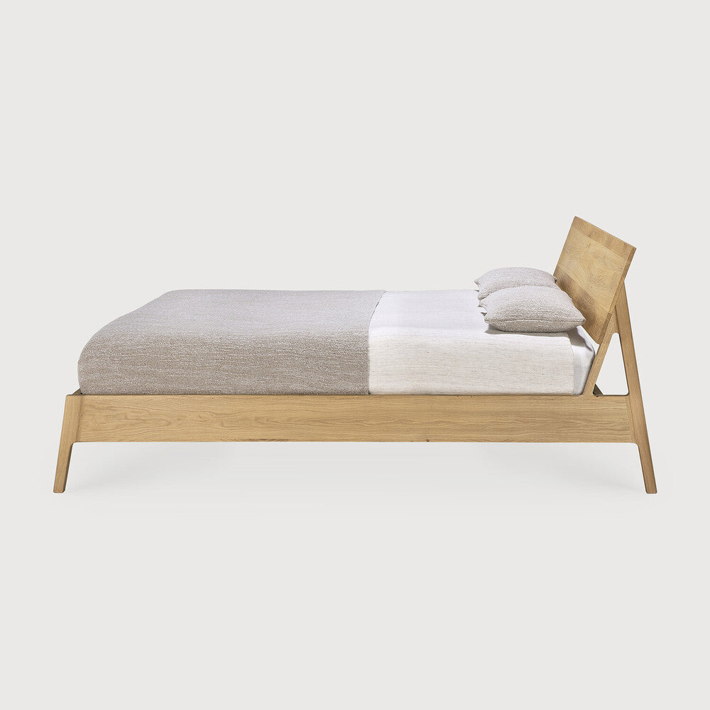 Featuring Air Bed Oak by Ethnicraft at Amethyst Home. The name 'Air Bed' says it all: the idea was to add softness, roundness and overall lightness to the usual concept of a bed. Ethnicraft’s Air bed in solid oak manages to look sturdy yet light at the same time.
King Dimensions: 93"d x 84"w x 38"h
Queen Dimensions: 93"d x 68.5"w x 38"h
Bed slats included : . Amethyst Home provides interior design, new home construction design consulting, vintage area rugs, and lighting in the Monterey metro area.