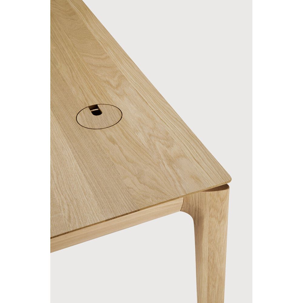 Reminiscent of a goat's curved horns, the Bok collection combines sculptural elegance and contemporary crafting into a graceful and airy form. This Bok desk adds the warmth of solid wood and simplistic practicality to any office space. Amethyst Home provides interior design, new home construction design consulting, vintage area rugs, and lighting in the Kansas City metro area.