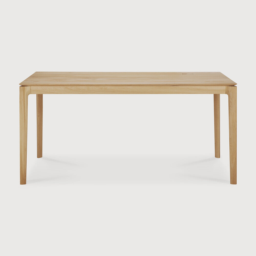 Reminiscent of a goat's curved horns, the Bok collection combines sculptural elegance and contemporary crafting into a graceful and airy form. This Bok desk adds the warmth of solid wood and simplistic practicality to any office space. Amethyst Home provides interior design, new home construction design consulting, vintage area rugs, and lighting in the Washington metro area.