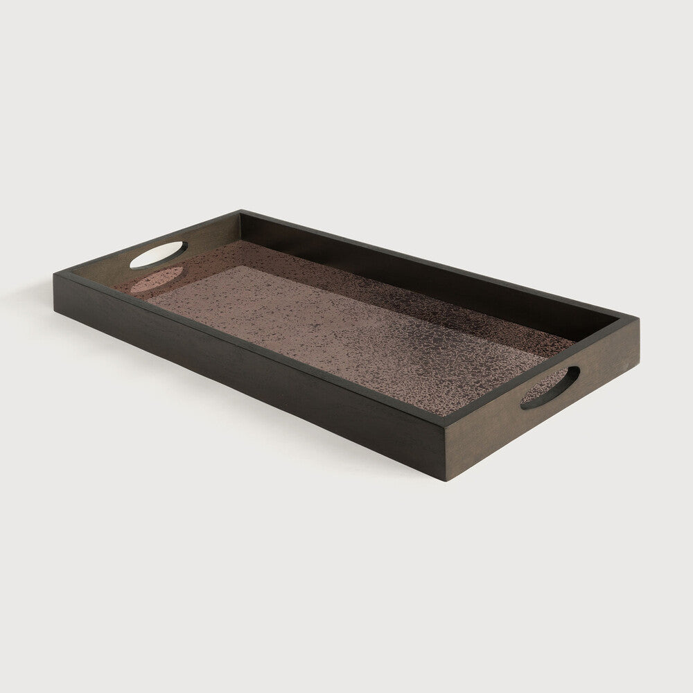Featuring Bronze Mirror Tray by Ethnicraft at Amethyst Home. A subdued color palette meets captivating motifs inspired by nature and travel. This bronze mirror tray experiments with the balance between rich patterns offset with muted tones, revealing the beauty behind the deceivingly ordinary subjects from which inspiration is drawn. In doing so, this collection captures the essence of timele. Amethyst Home provides interior design services, furniture, rugs, and lighting in the Seattle metro area.