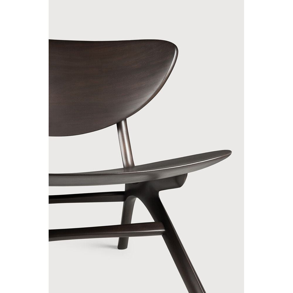 Beauty is in the eye of the beholder. With sleek, angular, front legs and flowing smooth connections, the Eye lounge chair is a hallmark solid wooden seating design. The curved backrest, reminiscent of a winked eye, inspired the name of the chair. Think subtle elegance with a stylish edge. Amethyst Home provides interior design, new home construction design consulting, vintage area rugs, and lighting in the Newport Beach metro area.