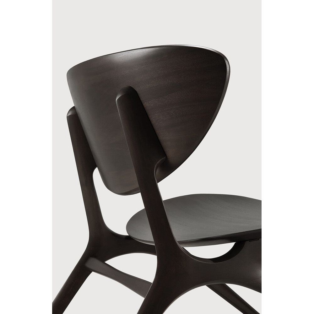 Beauty is in the eye of the beholder. With sleek, angular, front legs and flowing smooth connections, the Eye lounge chair is a hallmark solid wooden seating design. The curved backrest, reminiscent of a winked eye, inspired the name of the chair. Think subtle elegance with a stylish edge. Amethyst Home provides interior design, new home construction design consulting, vintage area rugs, and lighting in the Salt Lake City metro area.