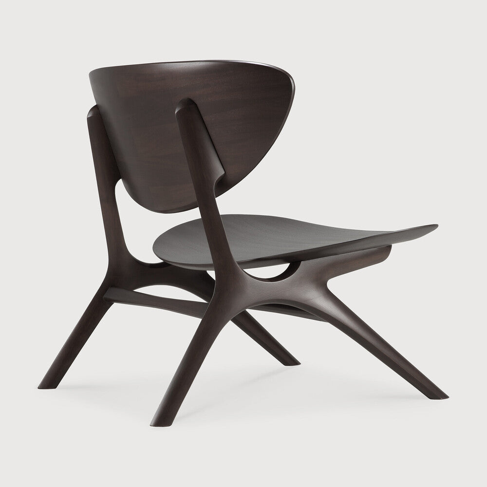 Beauty is in the eye of the beholder. With sleek, angular, front legs and flowing smooth connections, the Eye lounge chair is a hallmark solid wooden seating design. The curved backrest, reminiscent of a winked eye, inspired the name of the chair. Think subtle elegance with a stylish edge. Amethyst Home provides interior design, new home construction design consulting, vintage area rugs, and lighting in the Scottsdale metro area.