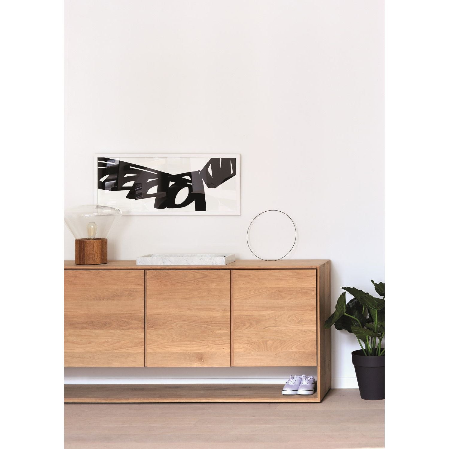 Our Nordic Sideboard refined design with the purity of solid wood. The bevelled edges gives this solid oak furniture an extra edge, we would say. Amethyst Home provides interior design services, furniture, rugs, and lighting in the Portland metro area.