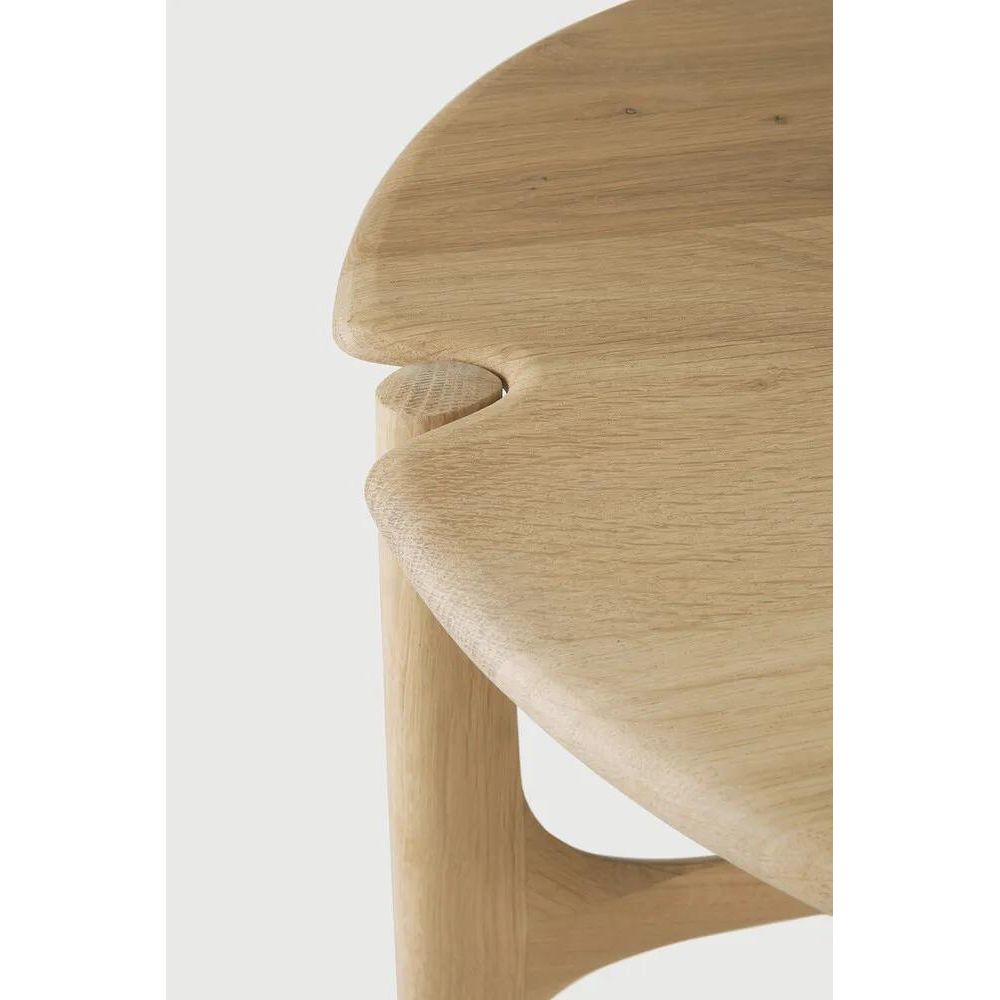 The PI collection honours nature’s design, by keeping the strength, curves, and lines, as nature intended. Interesting shapes are discovered in this sleek and stylish, polished imperfect, finish. Each PI side table is finished by hand to ensure that the individual character of the wood is respected. Designed by Alain van Havre Amethyst Home provides interior design, new home construction design consulting, vintage area rugs, and lighting in the Houston metro area.