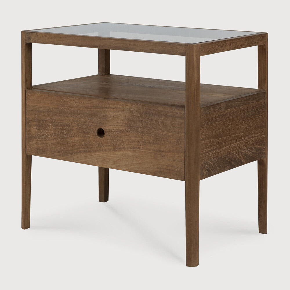 With its one drawer, open space and slightly tapered legs, the Spindle bedside table is the perfect no-nonsense companion for the striking Spindle bed. Reclaimed teak offers a truly unique finish for each and every item — the origin of each hand-finished piece of furniture carries its own story in its material. Amethyst Home provides interior design, new home construction design consulting, vintage area rugs, and lighting in the San Diego metro area.