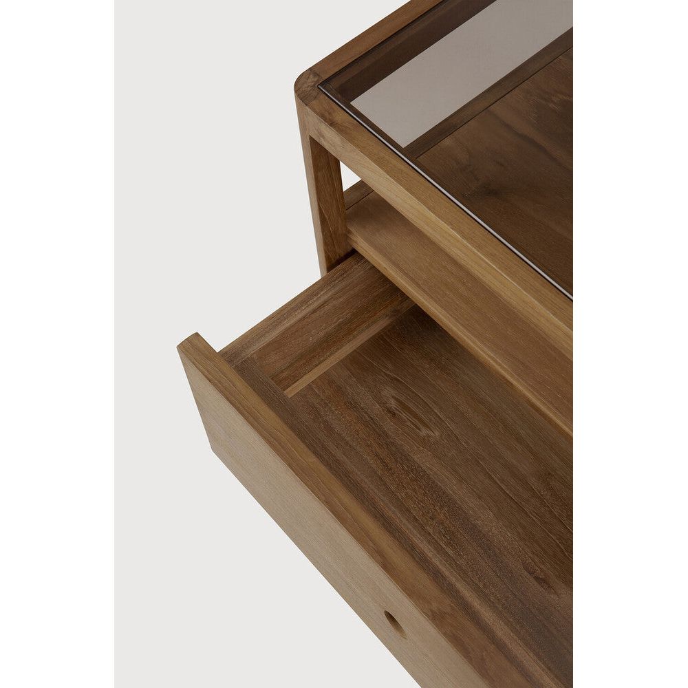 With its one drawer, open space and slightly tapered legs, the Spindle bedside table is the perfect no-nonsense companion for the striking Spindle bed. Reclaimed teak offers a truly unique finish for each and every item — the origin of each hand-finished piece of furniture carries its own story in its material. Amethyst Home provides interior design, new home construction design consulting, vintage area rugs, and lighting in the Winter Garden metro area.